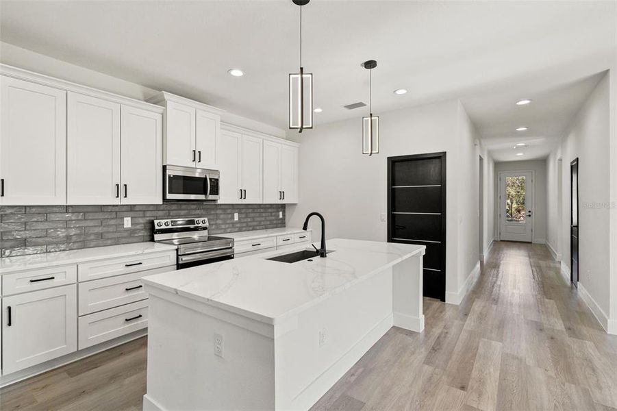 Furnished interior view inside a new home in , Dunnellon (Image 32).