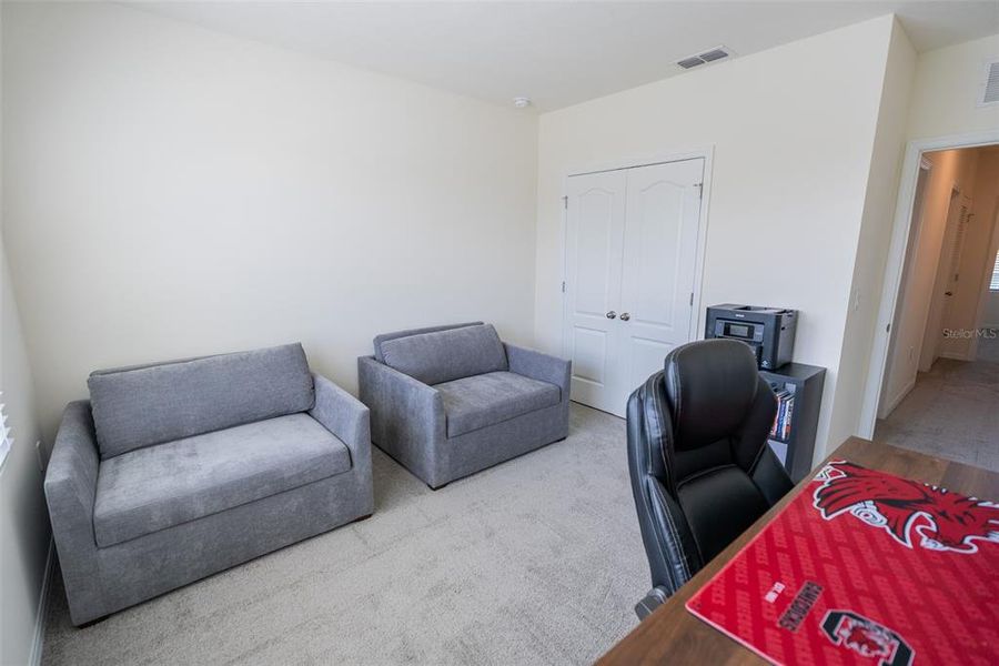 Furnished interior view inside a new home in Harmony at Lake Eloise, Winter Haven (Image 32).