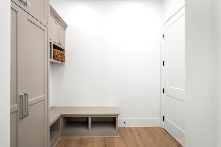 Huge mud room with custom built-ins. Huge mud room with custom built-ins.
