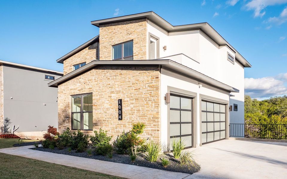 Front exterior of a new home in Preserve at Lakeway, Lakeway, TX, highlighting curb appeal (Image 19).