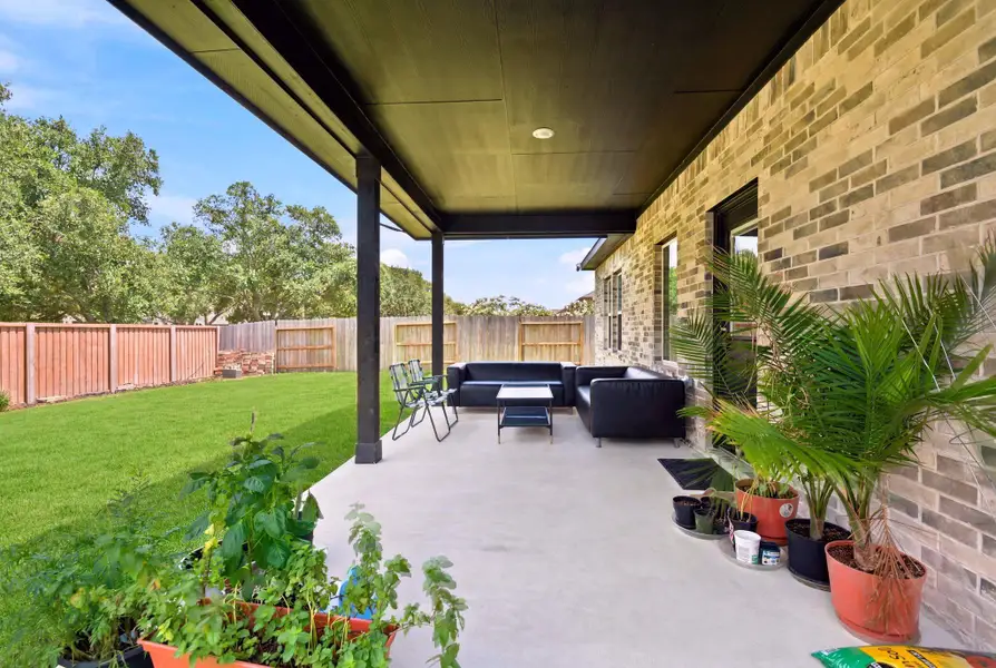 Exterior details and patio area of a home in Massey Oaks, Pearland (Image 4).