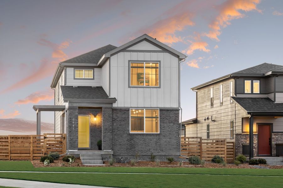 Front exterior of a home in the The Casitas Collection at Windler community, located in Aurora, CO (Image 14).