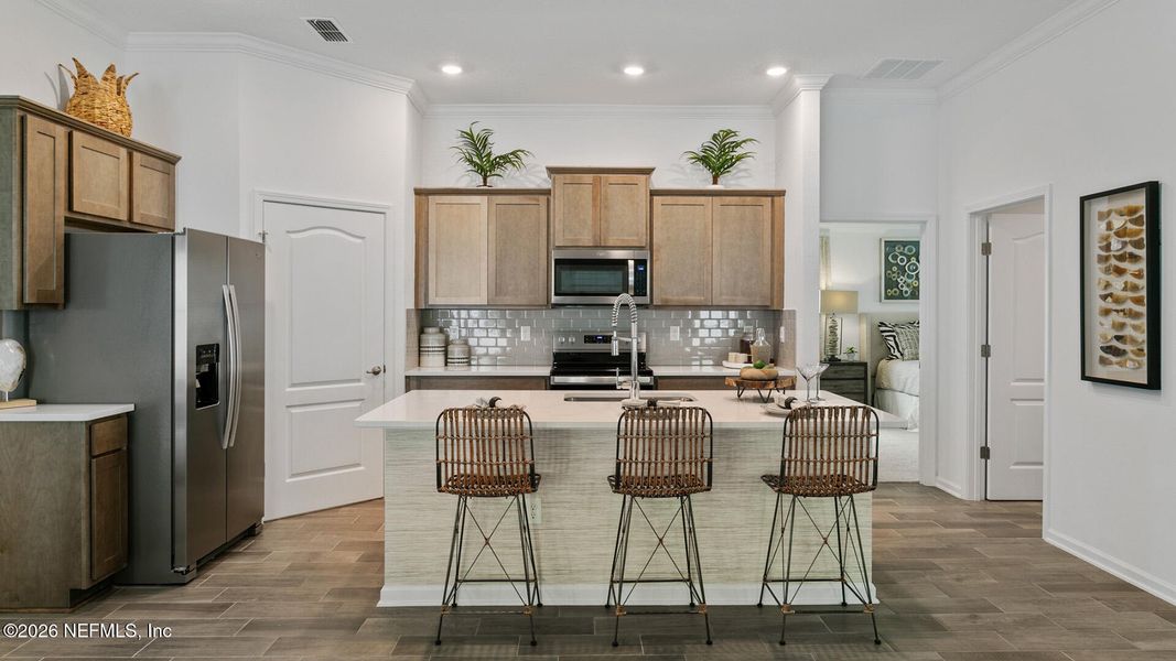 Furnished interior view inside a new home in Sawmill Branch, Palm Coast (Image 9). Furnished interior view inside a new home in Sawmill Branch, Palm Coast (Image 9).
