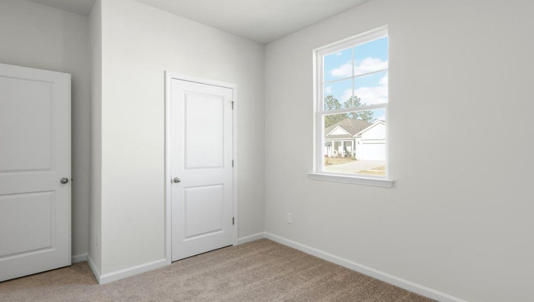 Representative unfurnished interior of a home built from the Kerry by D.R. Horton in Cedar Hill Landing, Navassa (Image 25).