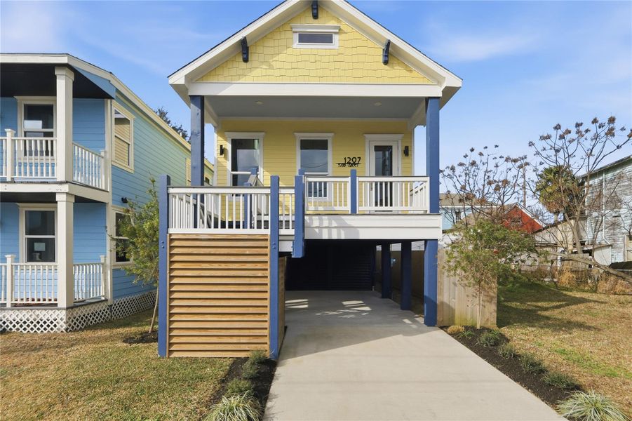 Front exterior of a new home in , Galveston, TX, highlighting curb appeal (Image 19).