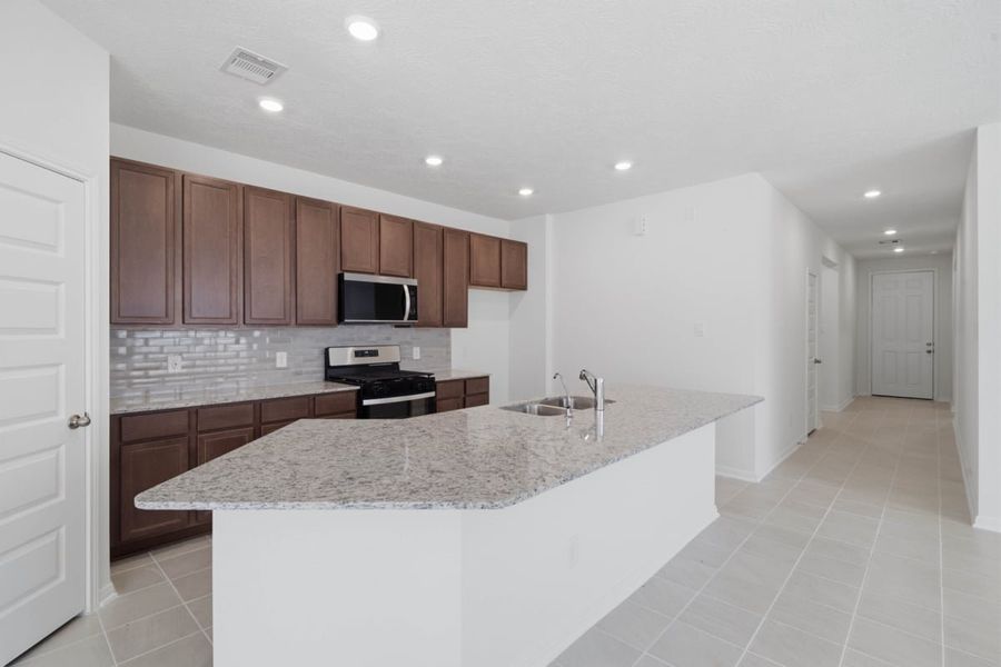 Furnished interior view inside a new home in Mustang Ridge, Magnolia (Image 3).