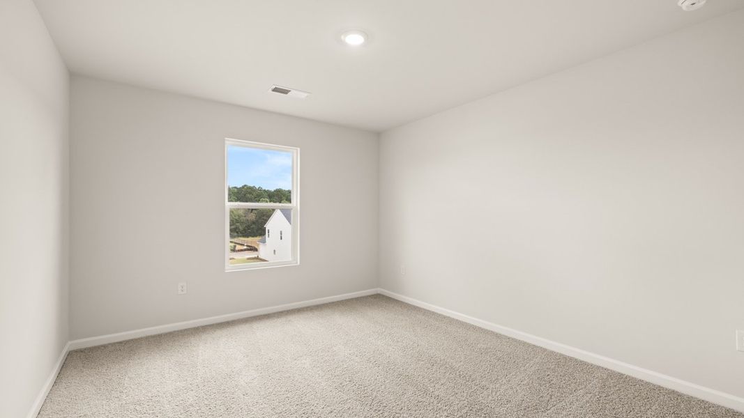 Spacious, unfurnished interior of a new home in Preserve at Dove Creek, Statham (Image 30).