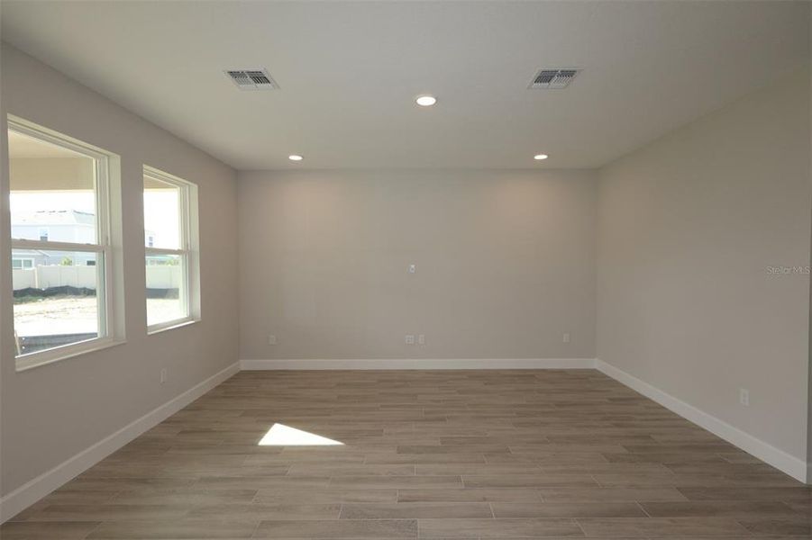 Spacious, unfurnished interior of a new home in Center Lake on the Park, St. Cloud (Image 13).