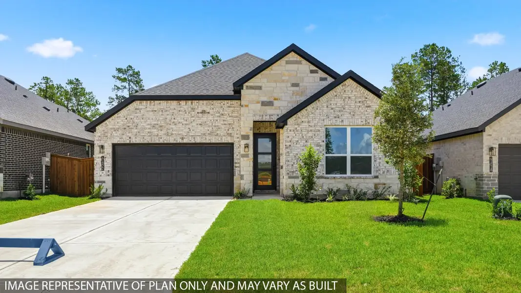 Front exterior of a new home in Mill Creek Estates, Magnolia, TX, highlighting curb appeal (Image 2). Front exterior of a new home in Mill Creek Estates, Magnolia, TX, highlighting curb appeal (Image 2).