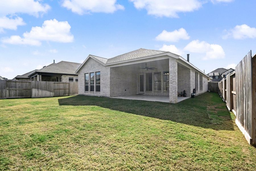 Exterior details and patio area of a home in Riceland 50', Mont Belvieu (Image 4). Exterior details and patio area of a home in Riceland 50', Mont Belvieu (Image 4).