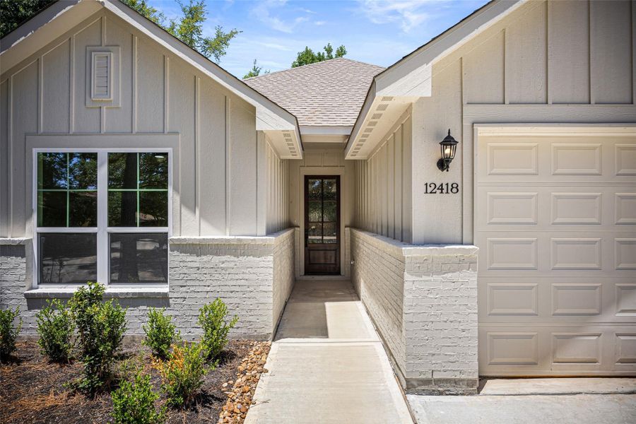Front exterior of a new home in , Montgomery, TX, highlighting curb appeal (Image 16). Front exterior of a new home in , Montgomery, TX, highlighting curb appeal (Image 16).