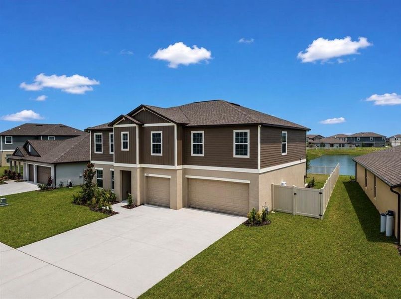 Front exterior of a new home in , Parrish, FL, highlighting curb appeal (Image 26). Front exterior of a new home in , Parrish, FL, highlighting curb appeal (Image 26).