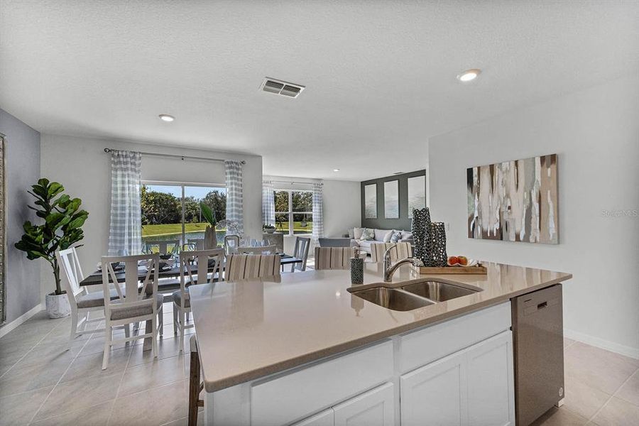 Furnished interior view inside a new home in , Winter Haven (Image 8). Furnished interior view inside a new home in , Winter Haven (Image 8).