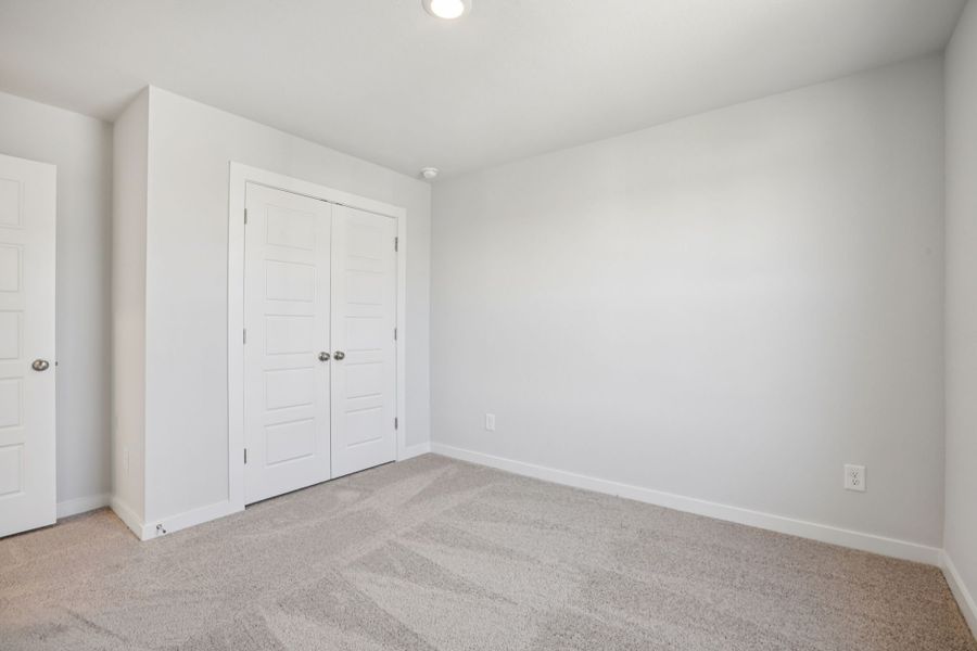 A room with white doors.