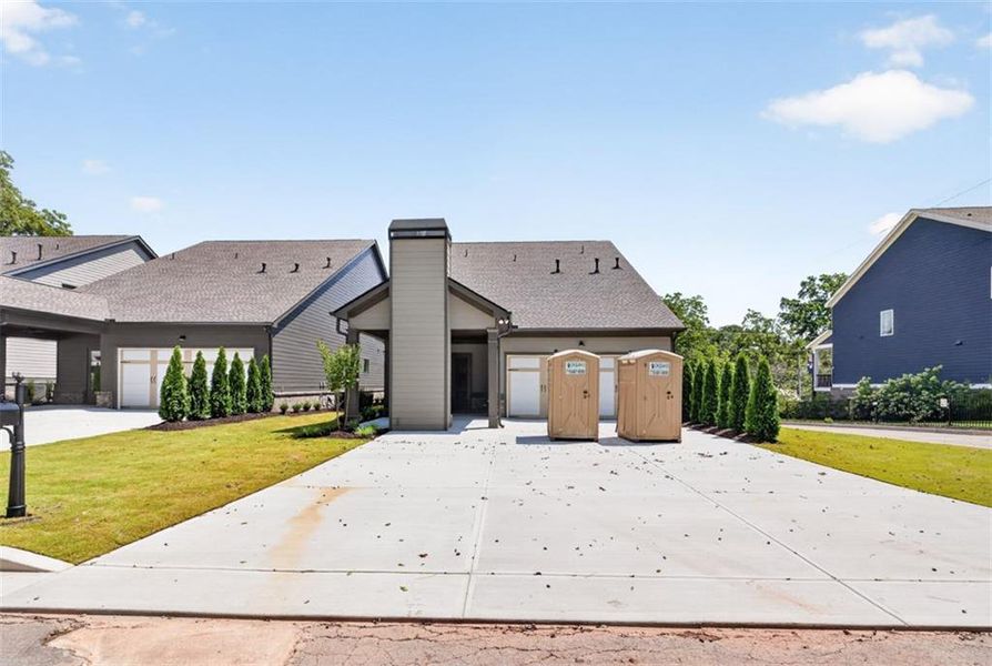 Front exterior of a new home in , Flowery Branch, GA, highlighting curb appeal (Image 33).