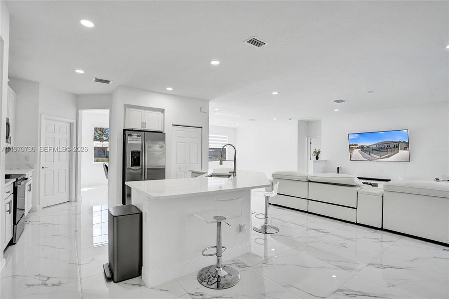 Furnished interior view inside a new home in , Loxahatchee (Image 80).