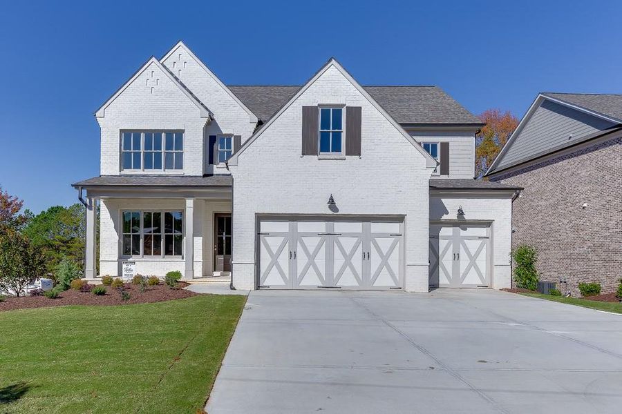 Front exterior of a new home in , Buford, GA, highlighting curb appeal (Image 2). Front exterior of a new home in , Buford, GA, highlighting curb appeal (Image 2).