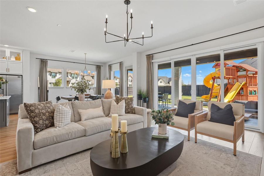 Open floorplan connects kitchen, dining and living areas. Open floorplan connects kitchen, dining and living areas.