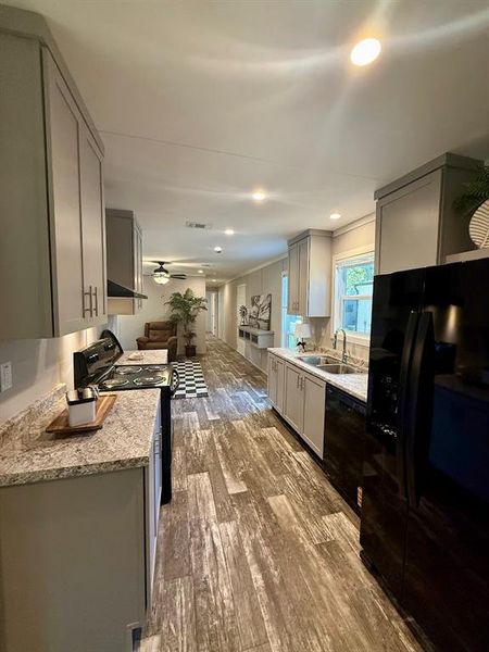 Furnished interior view inside a new home in , Pelican Bay (Image 15). Furnished interior view inside a new home in , Pelican Bay (Image 15).