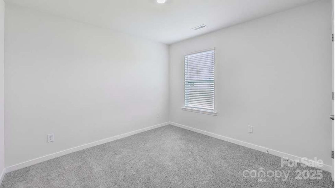 Spacious, unfurnished interior of a new home in Cardinal Creek, Charlotte (Image 24).