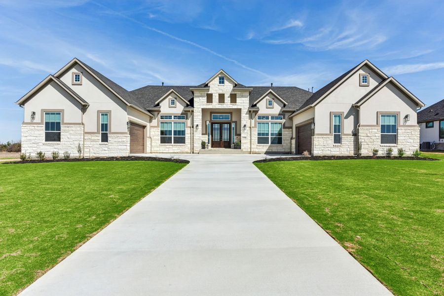 Front exterior of a new home in Feathergrass, Florence, TX, highlighting curb appeal (Image 26).