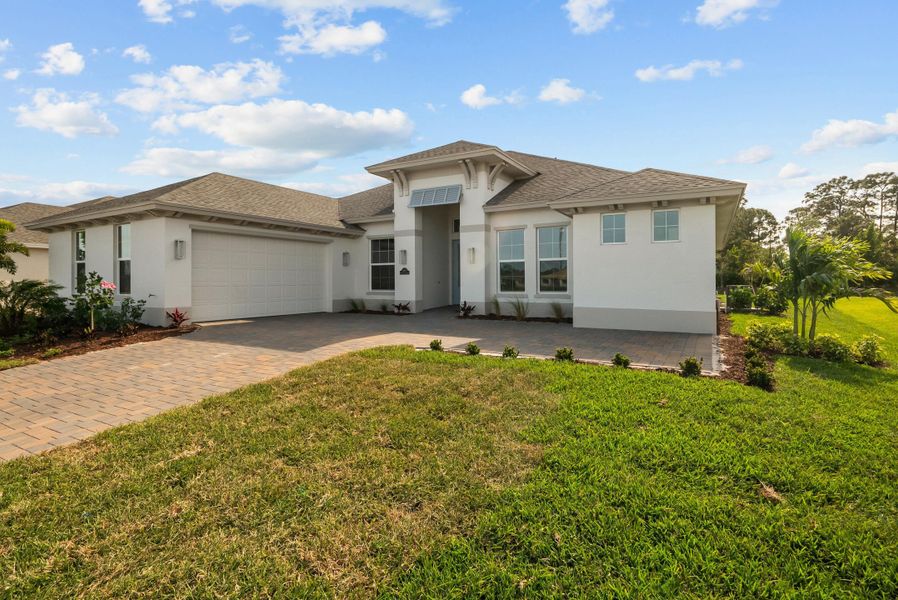 Representative exterior photo of a completed home built from the Weston Signature by GHO Homes in High Pointe, Vero Beach, FL (Image 27).