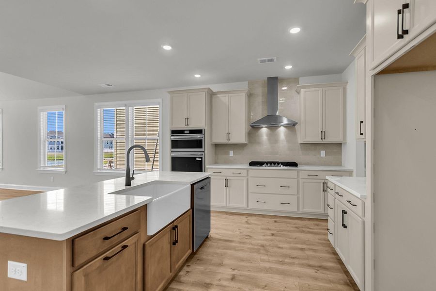 Furnished interior view inside a new home in Tidewater at Lakes of Cane Bay, Summerville (Image 7).