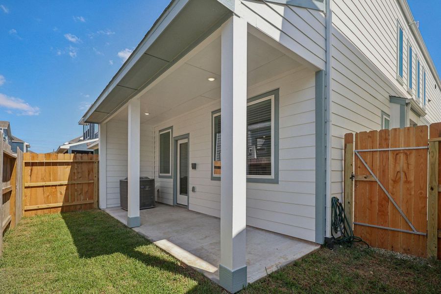 Exterior details and patio area of a home in Kemah Crossing - City Series, Kemah (Image 4). Exterior details and patio area of a home in Kemah Crossing - City Series, Kemah (Image 4).