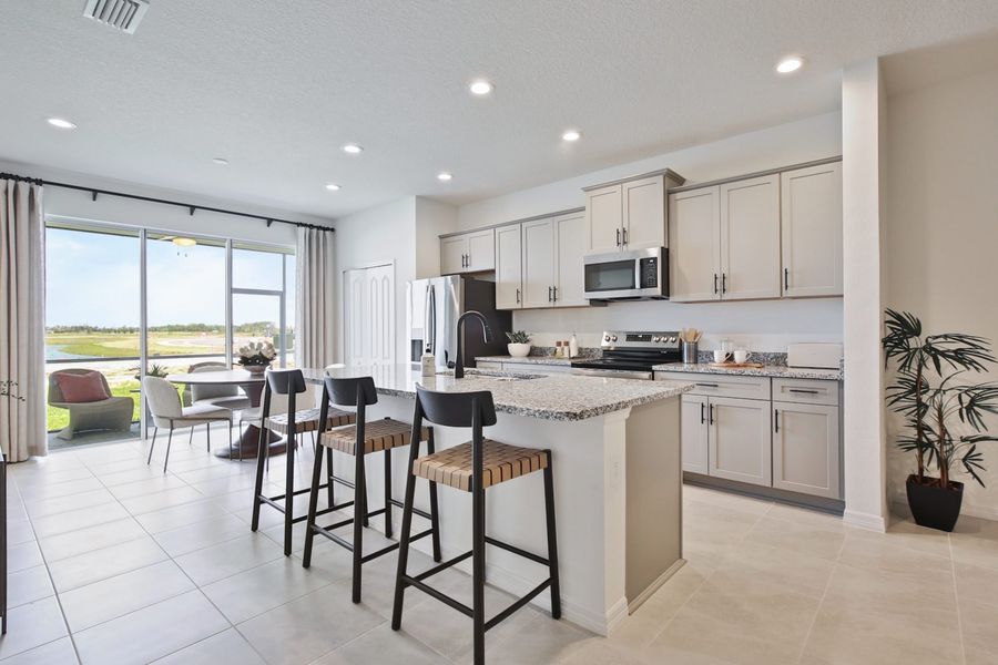 Representative furnished interior of a home built from the Morgan by Neal Communities in SkySail, Naples (Image 28).
