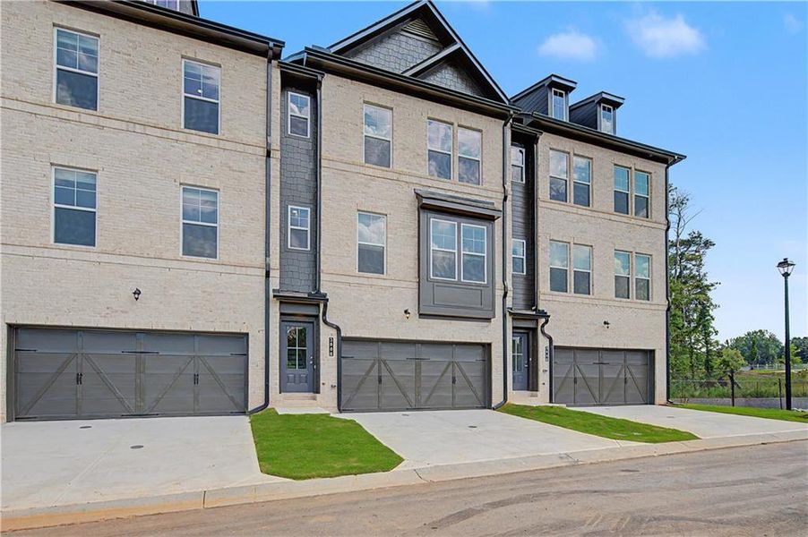 Front exterior of a new home in Daybreak, Newnan, GA, highlighting curb appeal (Image 19).