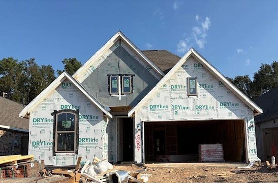 In-progress construction of a new home in The Highlands 45', Porter, TX (Image 13).