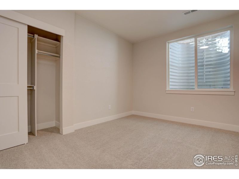 5th bedroom in the basement. Plenty of closet space down here too