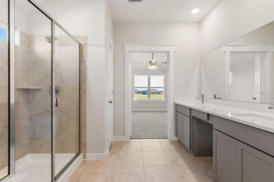 Furnished interior view inside a new home in Sunterra, Katy (Image 9).