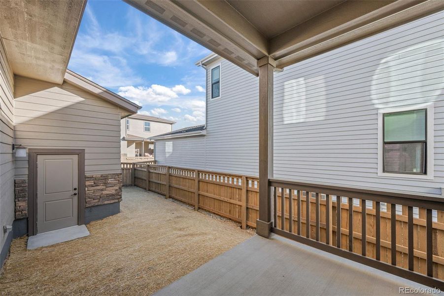 Exterior details and patio area of a home in Painted Prairie, Aurora (Image 1). Exterior details and patio area of a home in Painted Prairie, Aurora (Image 1).