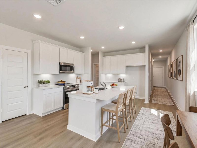 Furnished interior view inside a new home in Spring Branch Crossing, Conroe (Image 6).