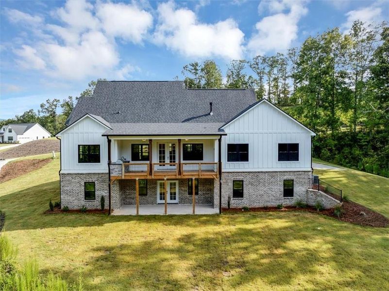 Front exterior of a new home in , Ball Ground, GA, highlighting curb appeal (Image 24).