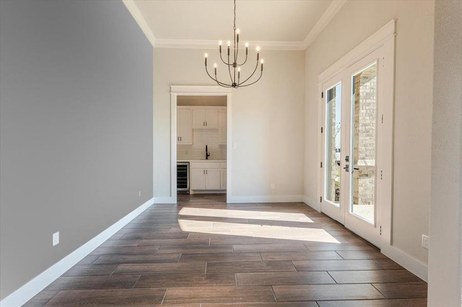 formal dining or office with private entry and mini bar with sink. formal dining or office with private entry and mini bar with sink.