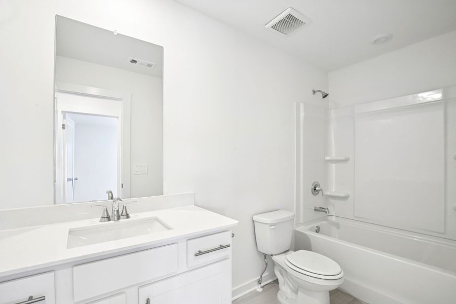Furnished interior view inside a new home in Greystone - Vista Townhomes, Smyrna (Image 8).