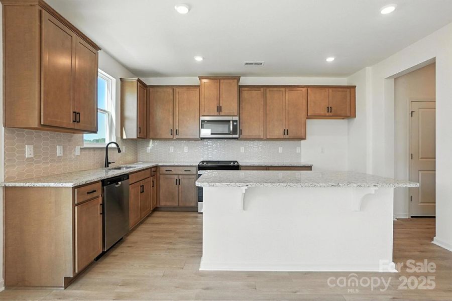 Furnished interior view inside a new home in Wellington Pointe Classic, Monroe (Image 4).