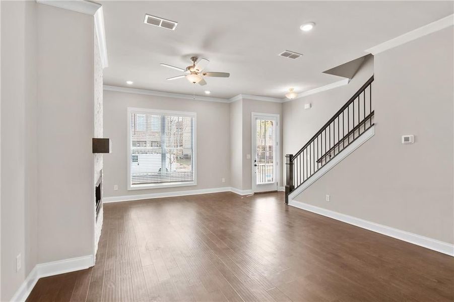 Hard Surface floors sweep through the main level. Photos are not of the exact property but are similar, the home is currently under construction.