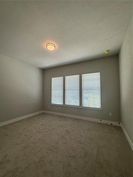 Spacious, unfurnished interior of a new home in Laureate Village, Newberry (Image 18).