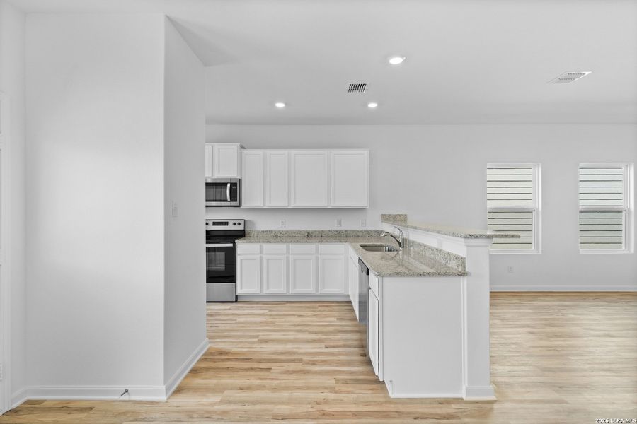 Furnished interior view inside a new home in , San Antonio (Image 7).
