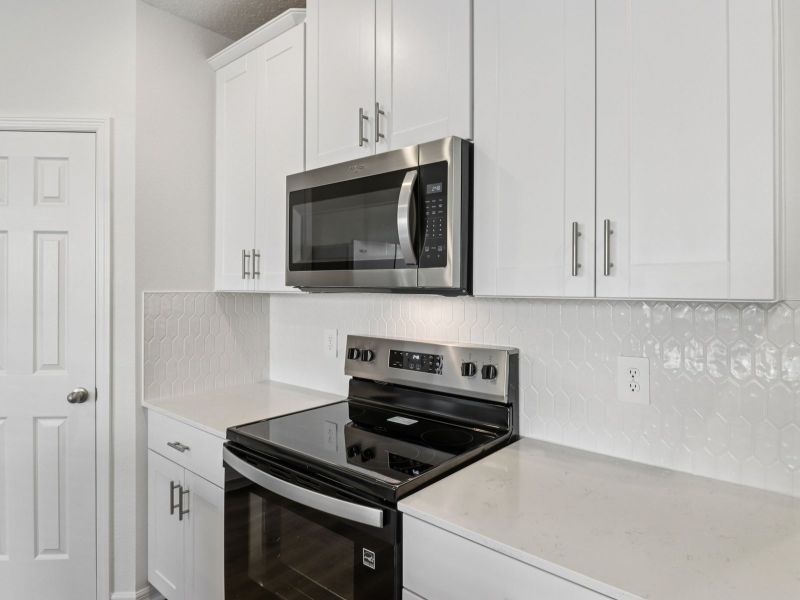 Furnished interior view inside a new home in Cagan Crossings West, Clermont (Image 3).