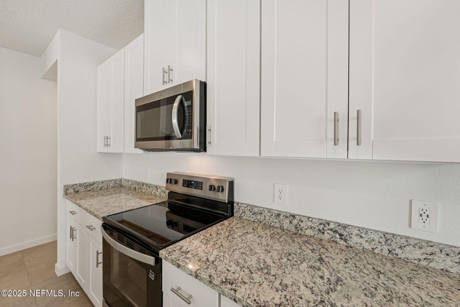 Furnished interior view inside a new home in Flagler Village - Classic Series, Palm Coast (Image 30). Furnished interior view inside a new home in Flagler Village - Classic Series, Palm Coast (Image 30).