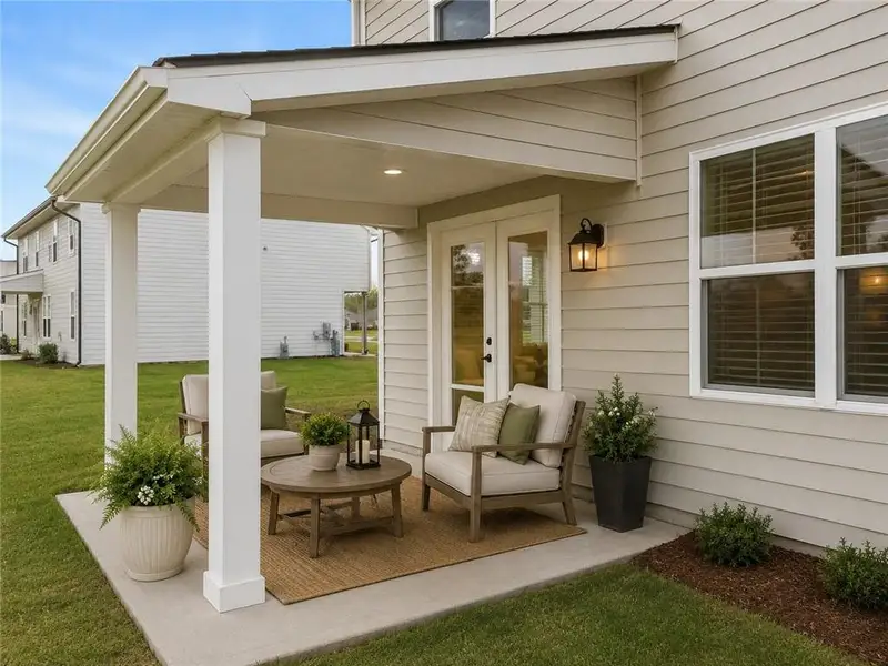 Exterior details and patio area of a home in Preserve at Dove Creek, Statham (Image 2). Exterior details and patio area of a home in Preserve at Dove Creek, Statham (Image 2).