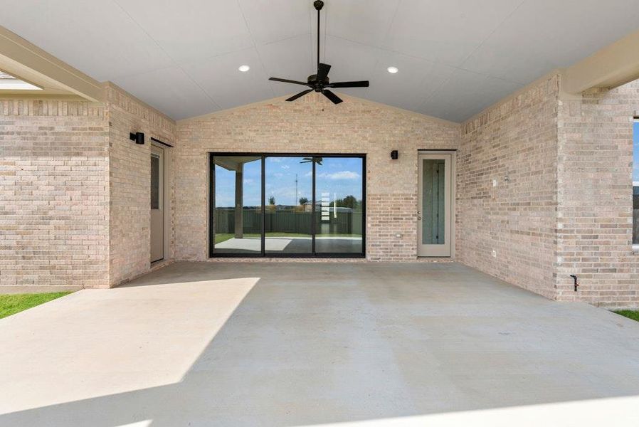 Exterior details and patio area of a home in Santa Rita Ranch, Liberty Hill (Image 21).