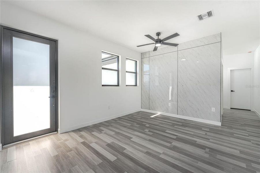 Spacious, unfurnished interior of a new home in , Port Charlotte (Image 51).
