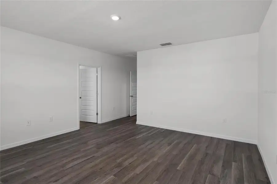 Spacious, unfurnished interior of a new home in Harmony at Lake Eloise, Winter Haven (Image 30). Spacious, unfurnished interior of a new home in Harmony at Lake Eloise, Winter Haven (Image 30).