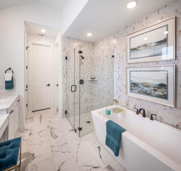 Bathroom with vanity, a marble finish shower, a freestanding tub, recessed lighting, and marble finish floor