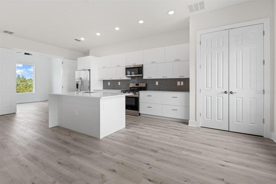 Furnished interior view inside a new home in , Port Charlotte (Image 15). Furnished interior view inside a new home in , Port Charlotte (Image 15).
